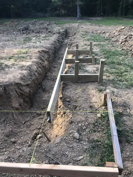 Footing trenches dug and formed