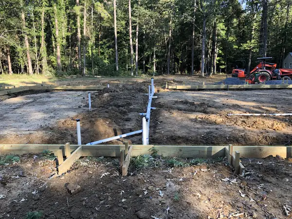 Plumbing stubbed up before the slab