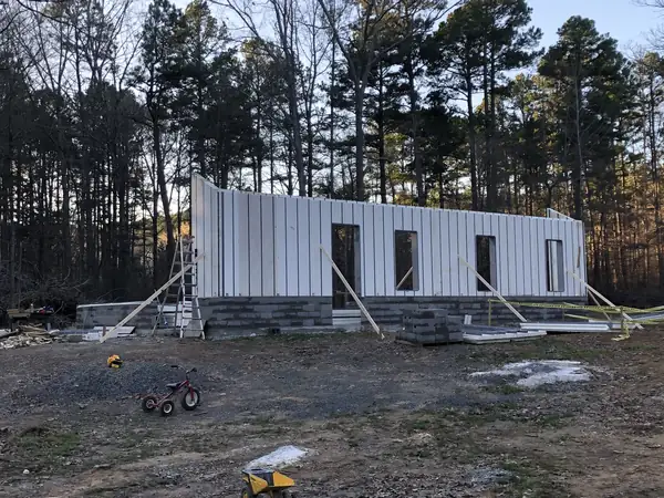 The walls go up